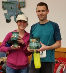 Women's champion Shelia Vibert (left) and men's champ Jarrod Brennet